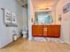 Bathroom with a double sink vanity and neutral earth tones at 344 Tall Palms Way, Little River, SC 29566