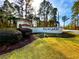 Palm Lakes community entrance with landscaped grounds at 344 Tall Palms Way, Little River, SC 29566