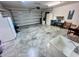 Spacious garage with ample room for parking and storage, plus a utility sink at 344 Tall Palms Way, Little River, SC 29566