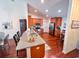 Well-lit kitchen featuring granite countertops, stainless steel appliances, and wood cabinets at 344 Tall Palms Way, Little River, SC 29566