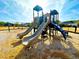Fun community playground featuring slides and climbing structures for children at 344 Tall Palms Way, Little River, SC 29566