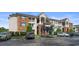 Brick condo building with ample parking and landscaping; unit #312 highlighted at 3786 Hitchcock Way # 312, Myrtle Beach, SC 29577