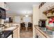 Open kitchen with breakfast bar, dining area, and stainless steel appliances at 3786 Hitchcock Way # 312, Myrtle Beach, SC 29577