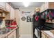 Galley kitchen with stainless steel appliances and ample cabinet space at 3786 Hitchcock Way # 312, Myrtle Beach, SC 29577