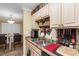 Clean kitchen with double sink and view into the adjacent dining area at 3786 Hitchcock Way # 312, Myrtle Beach, SC 29577