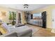 Comfortable living room with sectional sofa and patio access at 3786 Hitchcock Way # 312, Myrtle Beach, SC 29577
