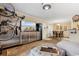 Bright living room features a large TV and comfortable seating at 3786 Hitchcock Way # 312, Myrtle Beach, SC 29577