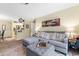 Living area with sectional sofa and view of kitchen at 3786 Hitchcock Way # 312, Myrtle Beach, SC 29577