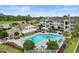 Resort-style pool with clubhouse and surrounding landscaping at 3786 Hitchcock Way # 312, Myrtle Beach, SC 29577