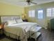 Bright bedroom with king-size bed and access to patio at 3866 Highway 17 Business # C-3, Murrells Inlet, SC 29576