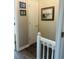 Clean hallway with framed artwork and storage closet at 3866 Highway 17 Business # C-3, Murrells Inlet, SC 29576
