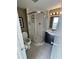 Clean bathroom with a shower/tub combo and vanity at 423 Parker Dr. # 511, Pawleys Island, SC 29585