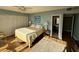 Bright bedroom with a queen-size bed and ample closet space at 423 Parker Dr. # 511, Pawleys Island, SC 29585