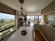 Bright dining room with ocean view and white table at 423 Parker Dr. # 511, Pawleys Island, SC 29585