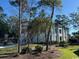 Charming backyard with a basketball hoop and lush landscaping at 429 Harbour View Dr., Myrtle Beach, SC 29579