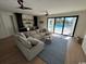Modern living room with a comfortable seating area, bar, and view of the pool at 429 Harbour View Dr., Myrtle Beach, SC 29579