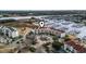 Overhead view of the condo complex near a marina and waterway with convenient parking at 4390 Bimini Ct. # 206-C, Little River, SC 29566