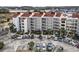 Well-maintained condo complex with multiple balconies and parking spaces near the marina at 4390 Bimini Ct. # 206-C, Little River, SC 29566