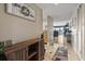 Welcoming condo entryway transitions into a spacious living area offering serene outdoor views of the boats at 4390 Bimini Ct. # 206-C, Little River, SC 29566
