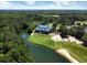 Aerial view of clubhouse and golf course at 478 Pinehurst Ln. # 17F, Pawleys Island, SC 29585