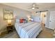 Bright bedroom with a comfortable bed and stylish decor at 478 Pinehurst Ln. # 17F, Pawleys Island, SC 29585