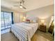 Spacious bedroom with sliding glass doors to a balcony at 478 Pinehurst Ln. # 17F, Pawleys Island, SC 29585