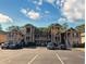Attractive condo building with ample parking and landscaping at 478 Pinehurst Ln. # 17F, Pawleys Island, SC 29585