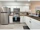 Modern kitchen with stainless steel appliances and wood countertops at 478 Pinehurst Ln. # 17F, Pawleys Island, SC 29585