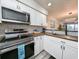 Updated kitchen with stainless steel appliances and wood countertops at 478 Pinehurst Ln. # 17F, Pawleys Island, SC 29585
