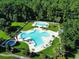 Community pool with hot tub and lounge area at 478 Pinehurst Ln. # 17F, Pawleys Island, SC 29585