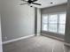 Bedroom with large window and ceiling fan at 4860 Carnation Circle # 304, Myrtle Beach, SC 29579