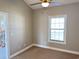 Spacious bedroom with window, ceiling fan and neutral walls at 4860 Carnation Circle # 304, Myrtle Beach, SC 29579