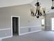 Dining room with carpet, chandelier and access to hallway at 4860 Carnation Circle # 304, Myrtle Beach, SC 29579