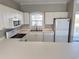 White kitchen with appliances, ample counter space and cabinets at 4860 Carnation Circle # 304, Myrtle Beach, SC 29579