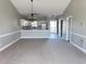 Open living room with kitchen, neutral colors and carpet at 4860 Carnation Circle # 304, Myrtle Beach, SC 29579