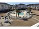 Community pool with lounge chairs and patio tables at 4860 Carnation Circle # 304, Myrtle Beach, SC 29579