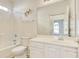 Bright bathroom with shower-tub combo and vanity at 5011 Harvest Dr. # 101, Myrtle Beach, SC 29579