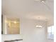 Bright living room featuring modern lighting and neutral wall paint at 5011 Harvest Dr. # 101, Myrtle Beach, SC 29579