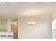 Bright living room featuring modern lighting and neutral wall paint at 5011 Harvest Dr. # 101, Myrtle Beach, SC 29579