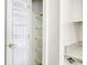 This pantry features multiple shelves, maximizing space and providing ample storage at 5011 Harvest Dr. # 101, Myrtle Beach, SC 29579