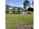 Scenic view of a pond and surrounding lawns at 5011 Harvest Dr. # 101, Myrtle Beach, SC 29579
