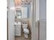 Small bathroom with toilet and sink at 534 Juniper Dr. # 534, Myrtle Beach, SC 29577