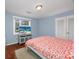 Main bedroom with a king-size bed and hardwood floors at 534 Juniper Dr. # 534, Myrtle Beach, SC 29577