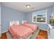 Two twin beds in a bedroom with hardwood floors and a window at 534 Juniper Dr. # 534, Myrtle Beach, SC 29577