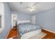Bedroom with king bed, hardwood floors, and access to bathroom at 534 Juniper Dr. # 534, Myrtle Beach, SC 29577