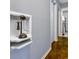 A hallway with an antique phone on display at 534 Juniper Dr. # 534, Myrtle Beach, SC 29577
