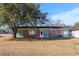 Brick ranch house with teal accents and a spacious yard at 534 Juniper Dr. # 534, Myrtle Beach, SC 29577