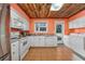 Bright kitchen features white cabinets, and a view to the backyard at 534 Juniper Dr. # 534, Myrtle Beach, SC 29577