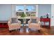 Bright living area with two armchairs and large windows at 534 Juniper Dr. # 534, Myrtle Beach, SC 29577