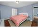 Main bedroom with a king-size bed and hardwood floors at 534 Juniper Dr. # 534, Myrtle Beach, SC 29577